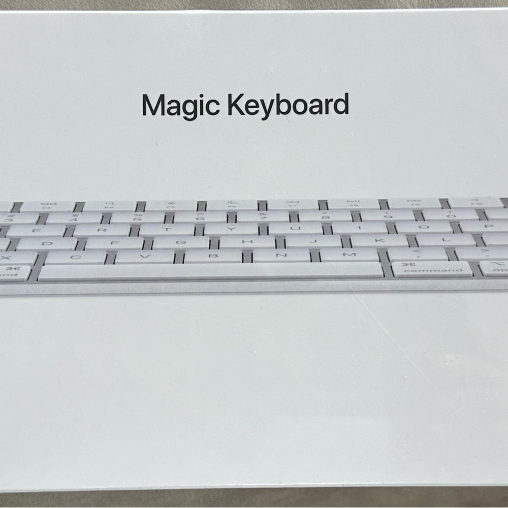 Apple Magic Keyboard. Wrapped in the box. Never been opened.